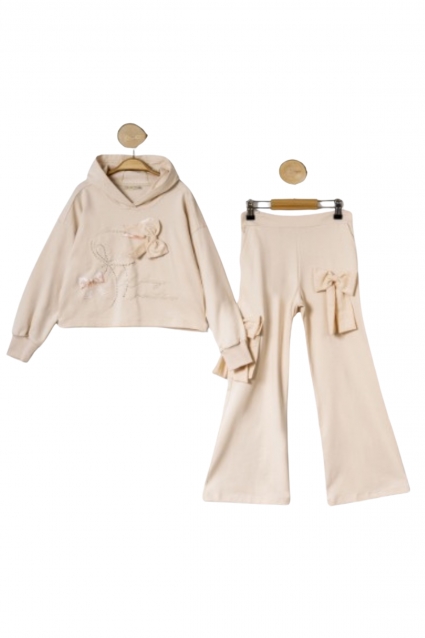 Children`s kit for a girl with a long sleeve, beige