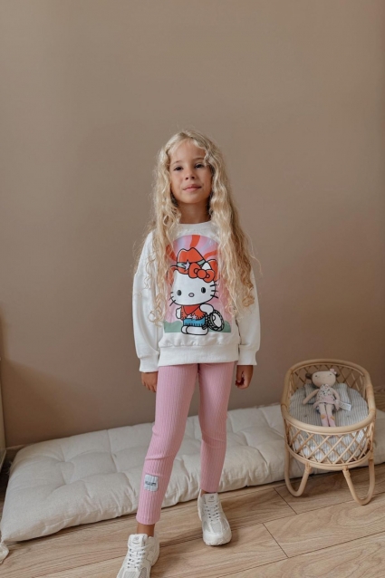 Children`s kit for a girl with a long sleeve, pink color