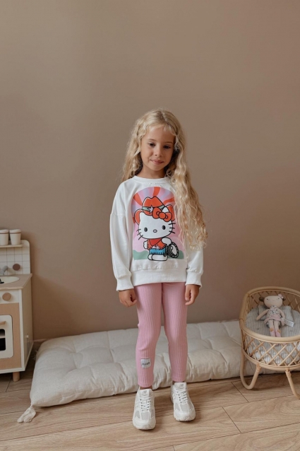 Children`s kit for a girl with a long sleeve, pink color