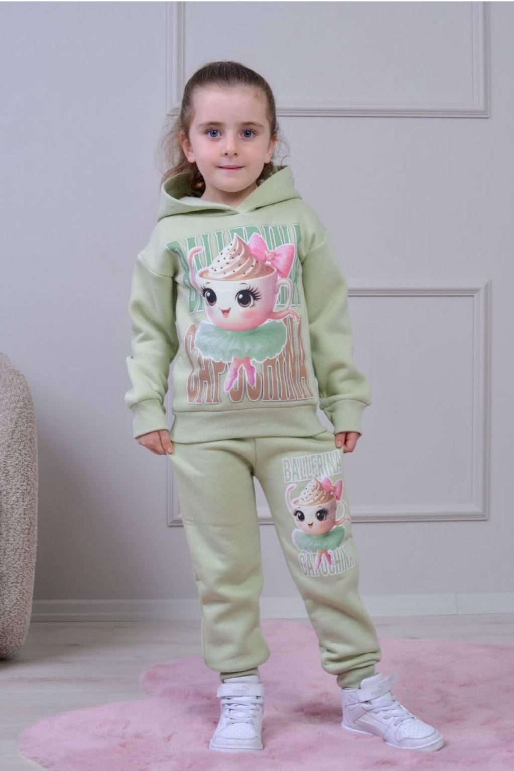 Children`s set for a girl with a long sleeve, green color