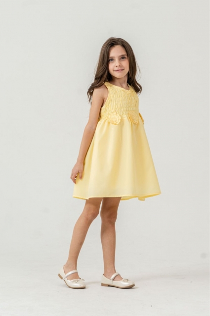 Children`s dress with straps, yellow color